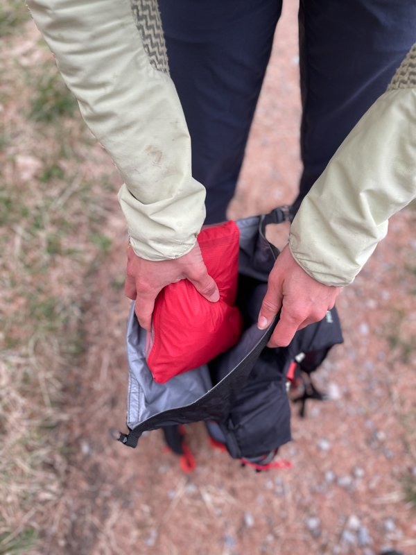 dimension jacket in a trail running backpack